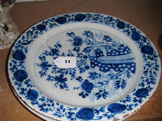 Delft blue and white flower-decorated charger and another charger (a.f)